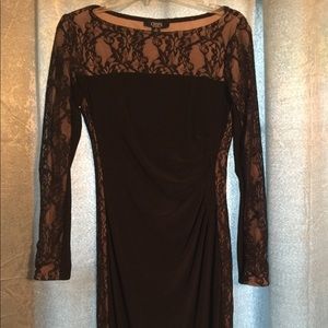 Gorgeous black, laced dress- lace on the sides.